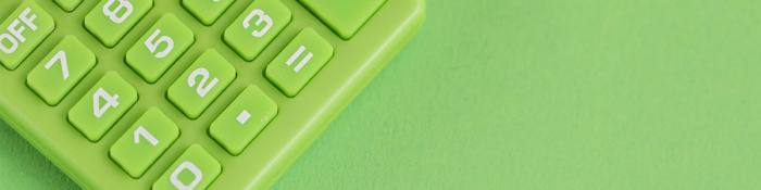 ESG: Grüner Taschenrechner mit weißen Tasten auf grünem Hintergrund