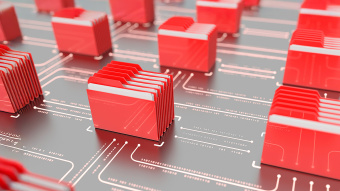 Rote Aktenordner stehen aufgereiht auf einer digitalen Oberläche.