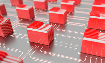 Rote Aktenordner stehen aufgereiht auf einer digitalen Oberläche.