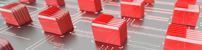 Rote Aktenordner stehen aufgereiht auf einer digitalen Oberläche.