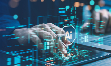 Symbolbild  zum Thema AI Souveränität. Zu sehen ist eine Hand, die auf einer Tastatur schreibt, davor ist ein AI-Symbol abgebildet. 