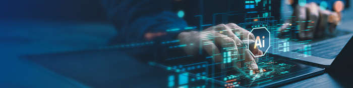 Symbolbild  zum Thema AI Souveränität. Zu sehen ist eine Hand, die auf einer Tastatur schreibt, davor ist ein AI-Symbol abgebildet. 